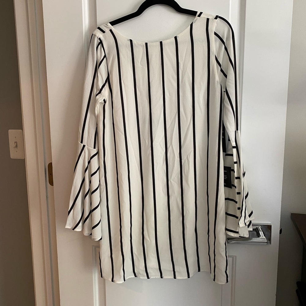 White and black striped dress with bell sleeves